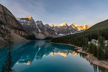 Incredible sunrise scenes at Moraine Lake, Banff National Park during fall, autumn with stunning, popular tourism spot in the Canadian Rockies. 