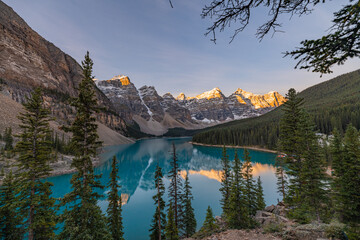 Incredible sunrise scenes at Moraine Lake, Banff National Park during fall, autumn with stunning, popular tourism spot in the Canadian Rockies. 