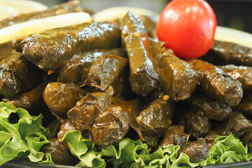 Traditional dolma grape leaves on a plate 