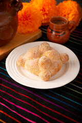 Pan de Muerto. Typical Mexican sweet bread that is consumed in the season of the day of the dead. It is a main element in the altars and offerings in the festivity of the day of the dead.