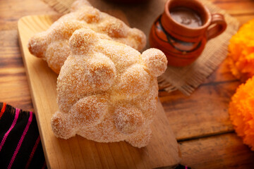 Pan de Muerto. Typical Mexican sweet bread that is consumed in the season of the day of the dead. It is a main element in the altars and offerings in the festivity of the day of the dead.