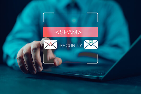 Email concept with laptop spam and virus computer monitor internet security concept, businessman reading electronic mail with a laptop. Spam, junk and e-marketing on screen, Spam Email Pop-up Warning.