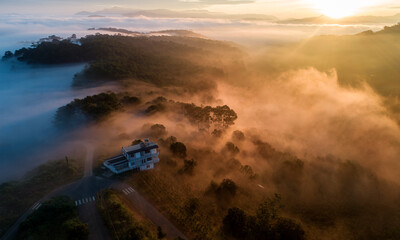 Morning landscape with magical mist over the city © PyTran