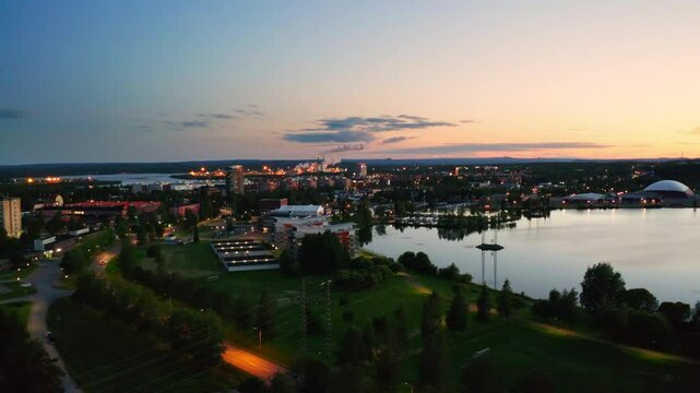 Beautiful Drone Footage of the Midnight Sun Setting over the City Pite&aring;, Sweden, Gradient Sky in Summer