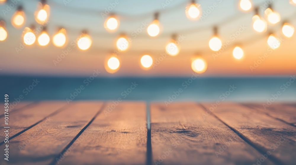 Poster the wooden deck glows with string lights while the sun sets over the ocean, offering a tranquil sett