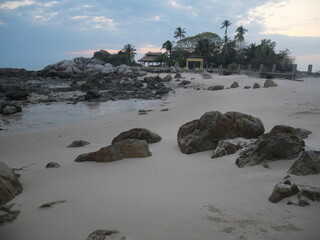 Bangka. Belitung. Bali. Indonesia. Beautiful beach view with large rocks, white sandy beach and rocky formations against bright blue sky, rugged nature