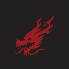 Naklejka premium red dragon head in black background