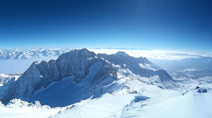 Snow-Covered Mountain Range with Clouds and Blue Sky