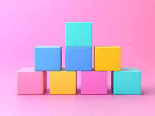Obraz premium Colorful stacked cubes on a pastel pink background, ideal for playful and creative design projects.