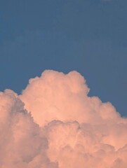 Cumulo form clouds with beautiful blue sky in horizon.