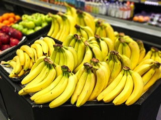 Fresh Bunches of Bananas Displayed at Grocery Store