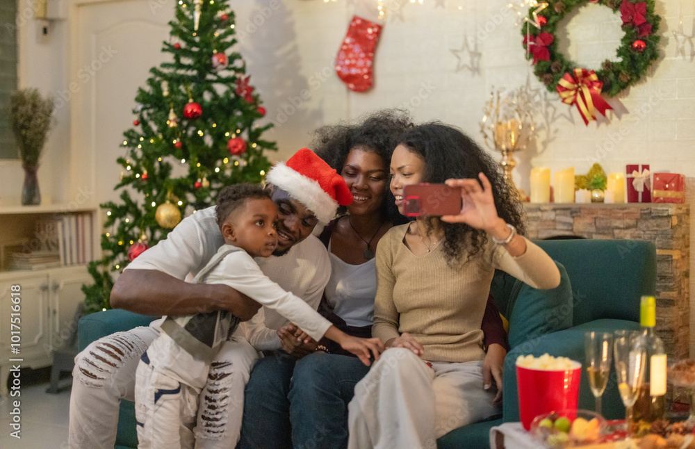 Wall mural cheerful black family christmas selfie and video call