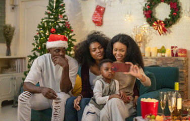 Cheerful Black Family Christmas Selfie and Video Call