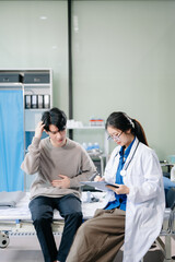 Obraz premium Doctor examining patient with symptoms in a clinic. Medical consultation and healthcare interaction.