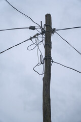 Electric pole with unorganized wires