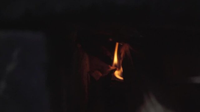 A clay comal on a wood stove, representing traditional cooking. The heat of the wood provides the perfect environment for cooking tortillas, while the smoke rises into the air.