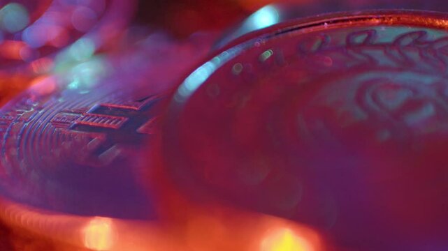 close-up shot of multiple bitcoins coins falling ontop of each other