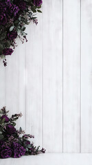 Fototapeta premium Purple flowers frame a white wood background.
