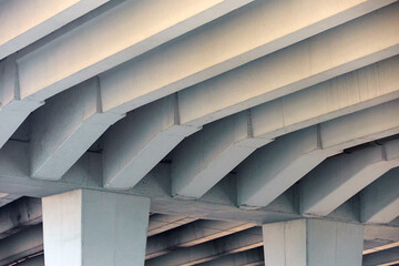 Reinforced Concrete Structure of Highway Overpass. View From Bottom Down. Concrete beams under the...