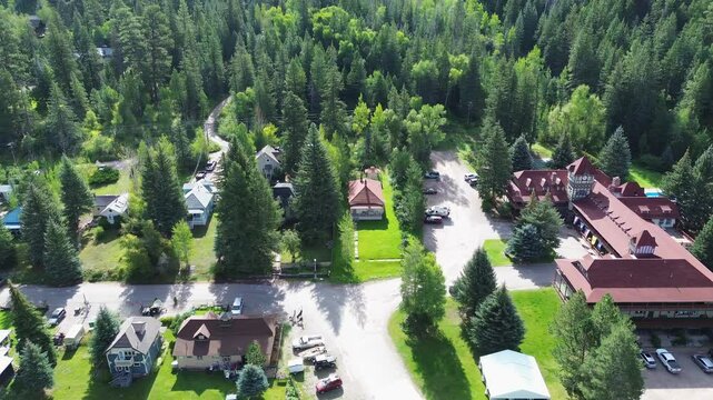 High angle flyover shot of the mountain village of Redstone, Colorado. Flight covers much of this small town.