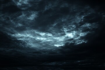 Fototapeta premium Dark, moody clouds create an atmospheric sky scene.