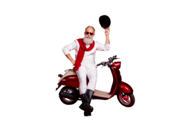 Aged macho man sit on retro moped greets every pretty lady street wear jumper and trousers isolated red background