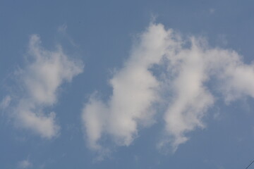 Dramatic white clouds with blue sky on sunny day