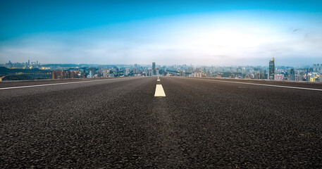 Expansive Urban Skyline View from a Wide Open Street Perspective