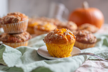 Pumpkin muffins with oat and brown sugar crumble