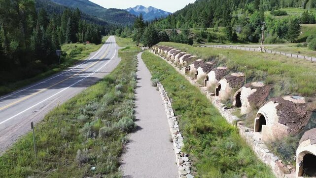 Inactive coke ovens near Redstone, Colorado. High angle flyover shot that travels along the row of ovens.