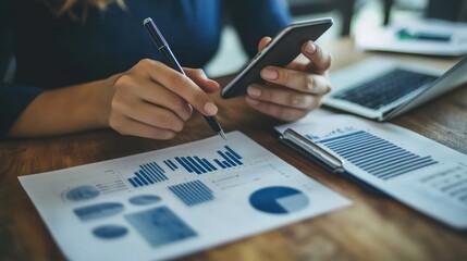 Business using smartphone for real-time updates, featuring professionals tracking business performance, inventory, or news on the go.