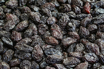 Background of tasty spicy olives in Volterra market, Tuscany, Italy