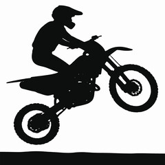 Fototapeta premium A silhouette of a male rider of Hispanic descent performing a jump on a dirt bike, framed by a backdrop of tall green trees and a bright midday sun 