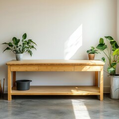 A wooden table with two drawers sits against a light wall, accompanied by potted plants, creating a serene and inviting atmosphere.