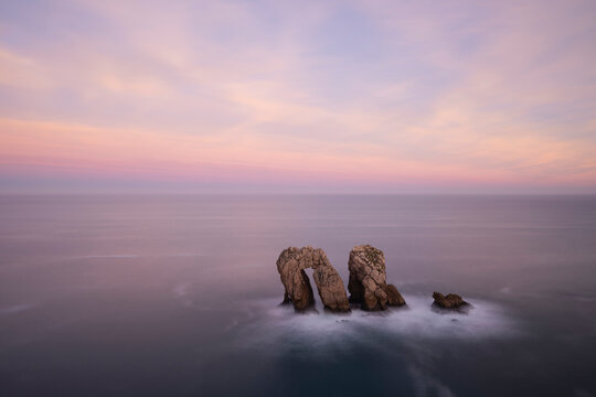 Urro del Manzano rock formation at sunset, Liencres, Spain