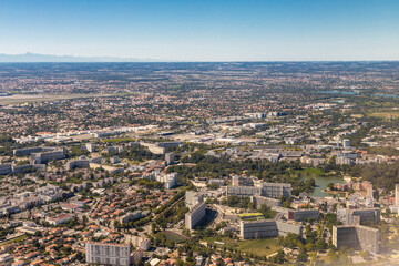 Aerial view over Toulouse city and the Occitania region in the south of France seen from a plane