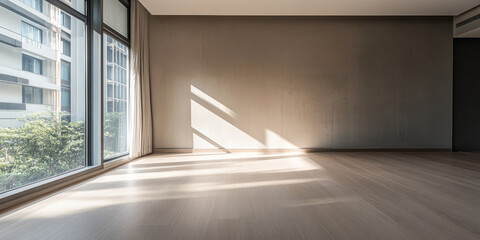 Obraz premium Spacious empty room with natural light streaming through large windows in a modern apartment