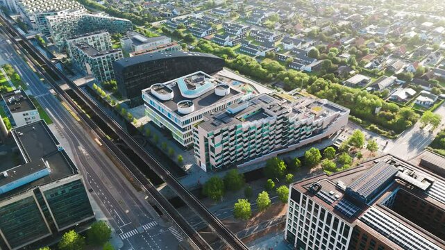 Aerial - futuristic building rooftops near Orestad metro line, Copenhagen