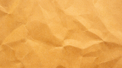 Abstract crumpled and creased recycle brown paper texture background