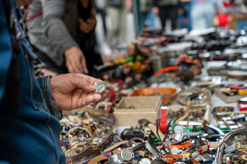 A flea market where people is looking for second hand things, second life concept