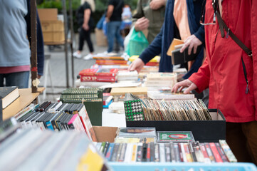 A flea market where people is looking for second hand things, second life concept