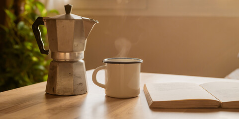 Inviting Morning Scene by the Window. A Hot Cup of Coffee or Tea, a Coffee Maker, and a Book Offer the Perfect Blend of Relaxation and Comfort At Home