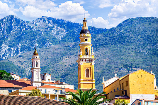 Fototapeta Bell tower of the Basilica of Saint Michael the Archangel in the historic center of the city of Menton on the French Riviera, Cote d'Azur, France