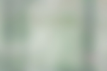 A blurred image shows a vibrant green background with faint lines