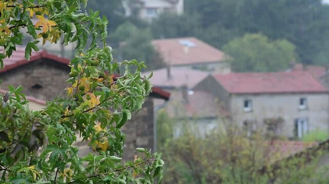 Rainy weather in a mountain village in France in the Auvergne Rhone Alpes region. Rain in autumn.