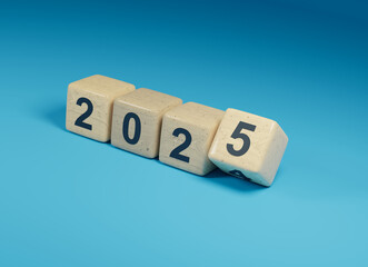Flipping wooden cubes with the Year number 2024 and 2025, New Year concept