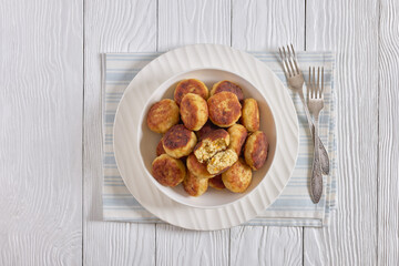 Northern Pike fish cakes in a white bowl