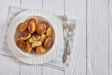 Northern Pike fish cakes in a white bowl