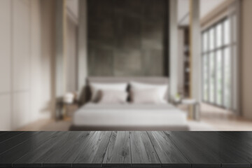 Wooden table mockup in front of blurred bedroom interior background. 3D Rendering