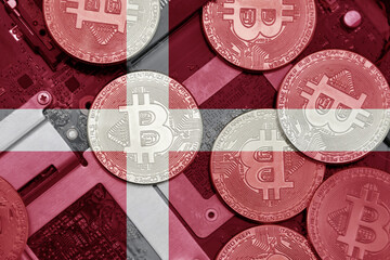 flag of denmark on the bitcoins with computer electronic circuit board background. bitcoin concept